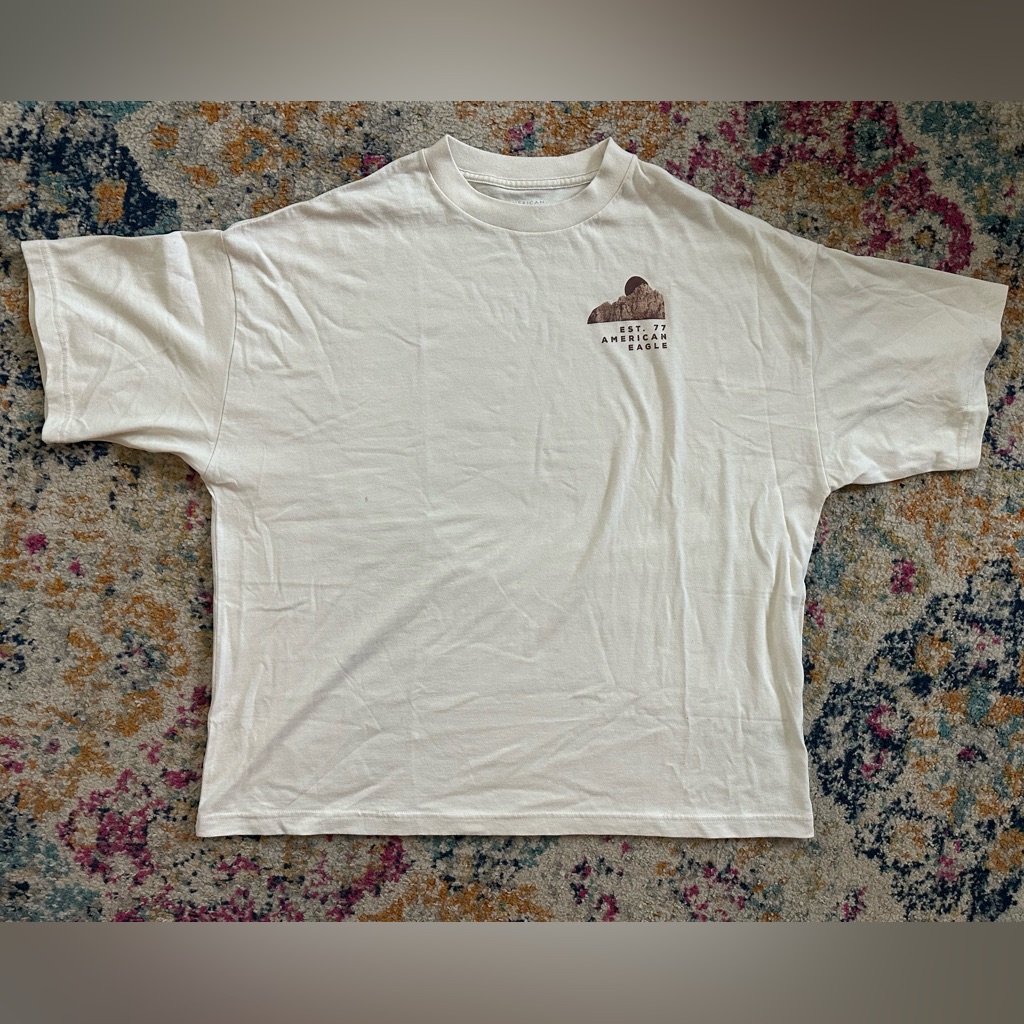 ‘77 American Eagle Outfitters Men's Cream Graphic Tee. Oversized Medium.